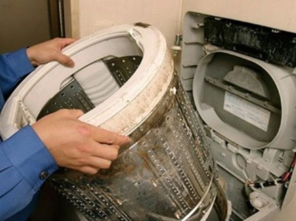 Tháo lồng máy giặt cửa trên