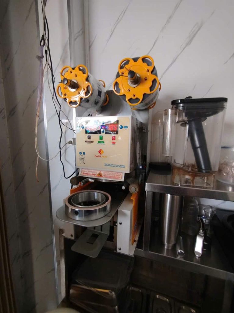 Máy ép miệng ly Fastmat không ép được – Ca kiểm tra thực tế 2026 may ep mieng ly fastmat khong ep duoc.jpg